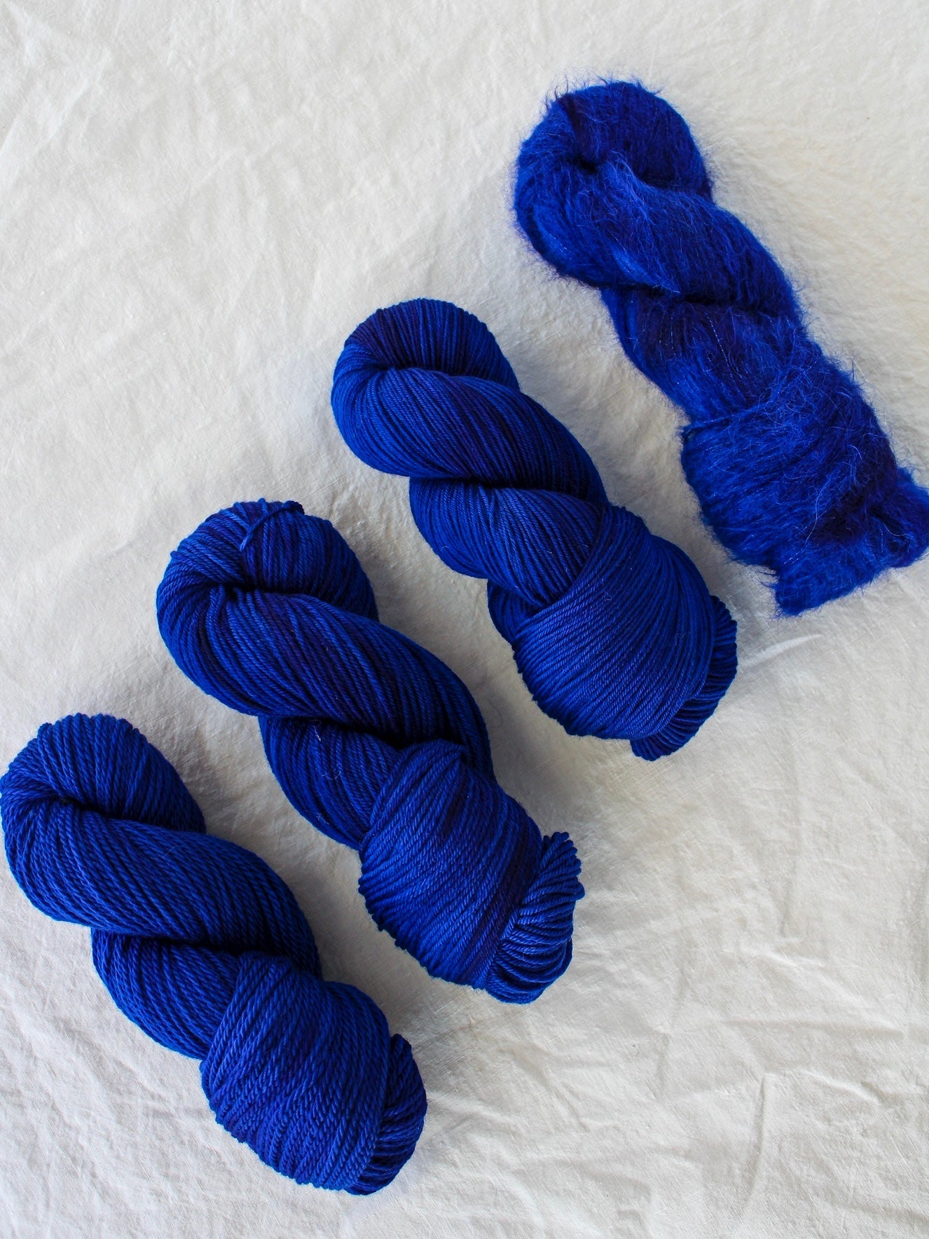 Glowing Indigo - Ruby and Roses Yarn - Hand Dyed Yarn